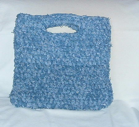 First for the crocheters out there, here is a pattern for a rag bag ...